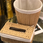 A stylish wicker trash